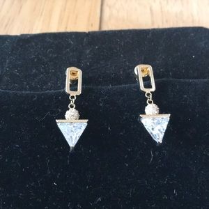 - New Crystal gold one inch drop earrings in triangle